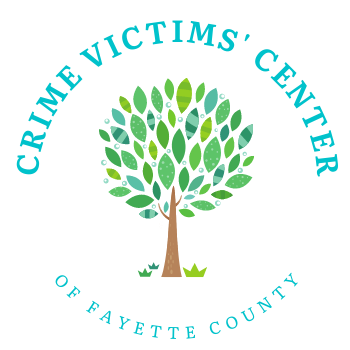 Logo for the Crime Victims' Center of Fayette County, featuring a tree with green leaves and a brown trunk.